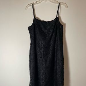 Vintage lace and rhinestone little black dress. Very flattering and sexy.